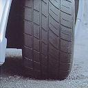 [tyre tread is asymmetic and directional]